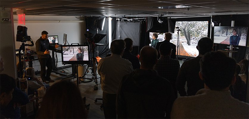 Jackson Grischeau, digital media specialist, demonstrates the new LED video wall’s capabilities. 