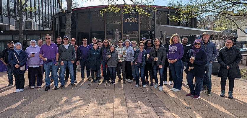 IT Staff volunteers gathering at the Litter League event on April 22.