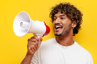 Man talking through a bullhorn