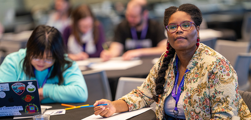 Attendees take notes during the “Beyond Defaults: Elevating Your Data Visualizations” morning workshop in the Louis Room.