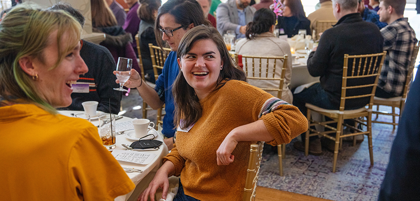 Northwestern IT staff gather at the Halim Time & Glass Museum in Evanston for the organization's annual winter celebration.