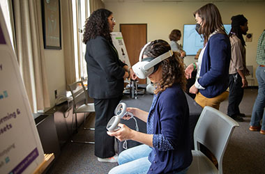 person using VR headset and controllers