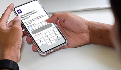 Person looking at updated Multi-factor Authentication