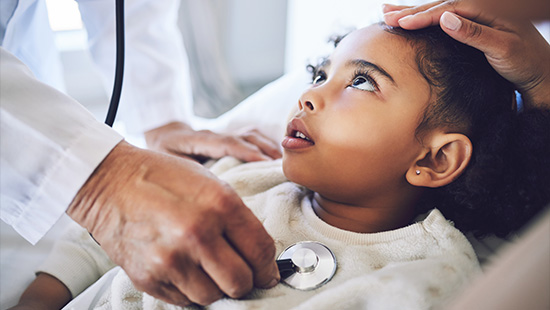 Hands, stethoscope and doctor with child for heart healthcare, breathing or check lungs for wellness in hospital