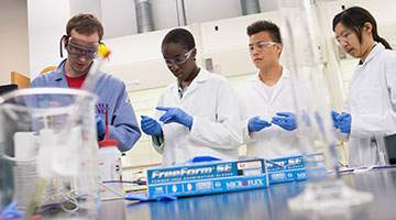 Northwestern researchers inside a lab
