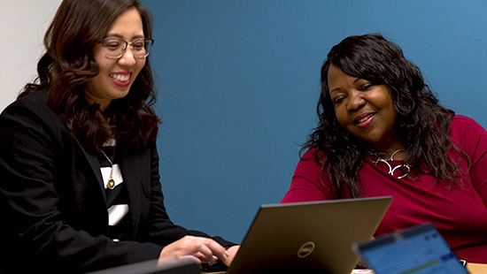 Staff member talking in a meeting