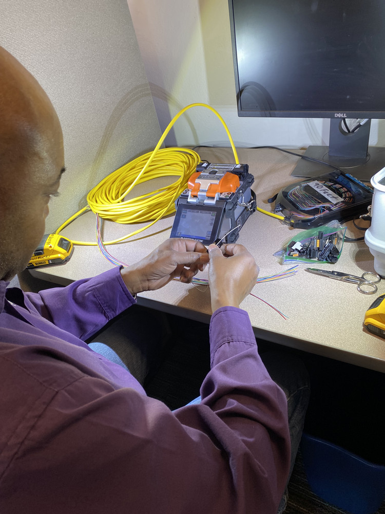 Torvis Robinson making and testing network cables