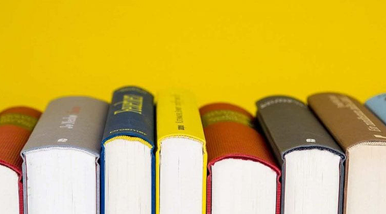 row of colorful book spines